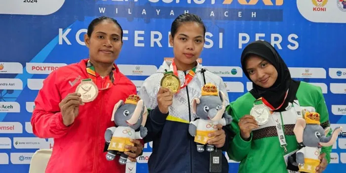 Tika Rulini – Emas Angkat Berat Kelas 63 kg Putri di PON XXI 2024