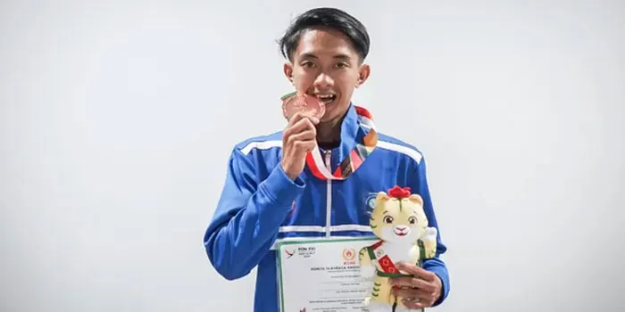 Tim Atletik Bangka Belitung Raih Medali Emas Pertama Melalui Robi Syianturi di PON XXI